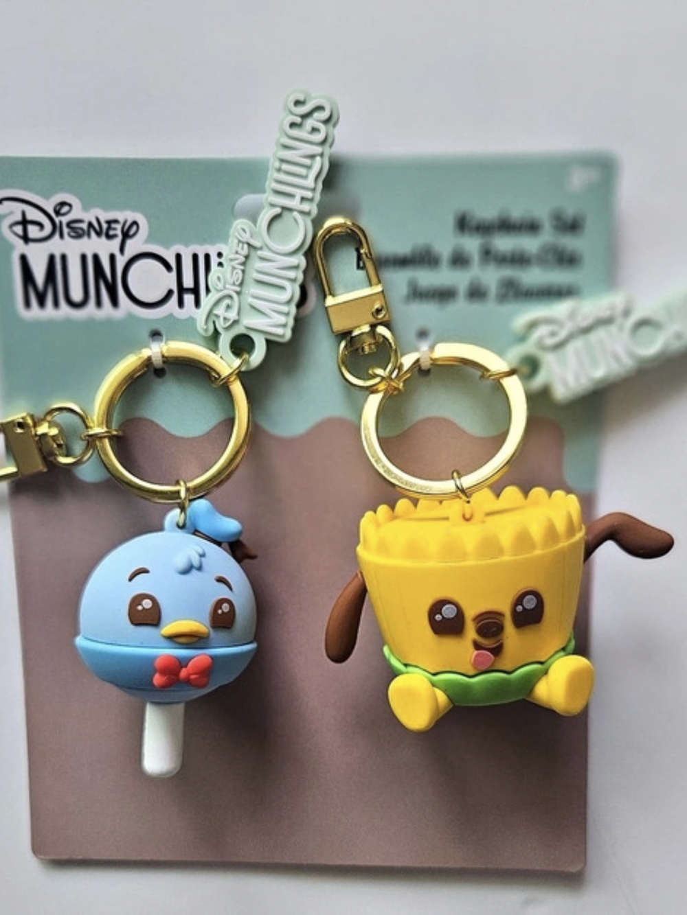 Disney Munchlings keychain set Keychain Set Yellow & Blue NWT